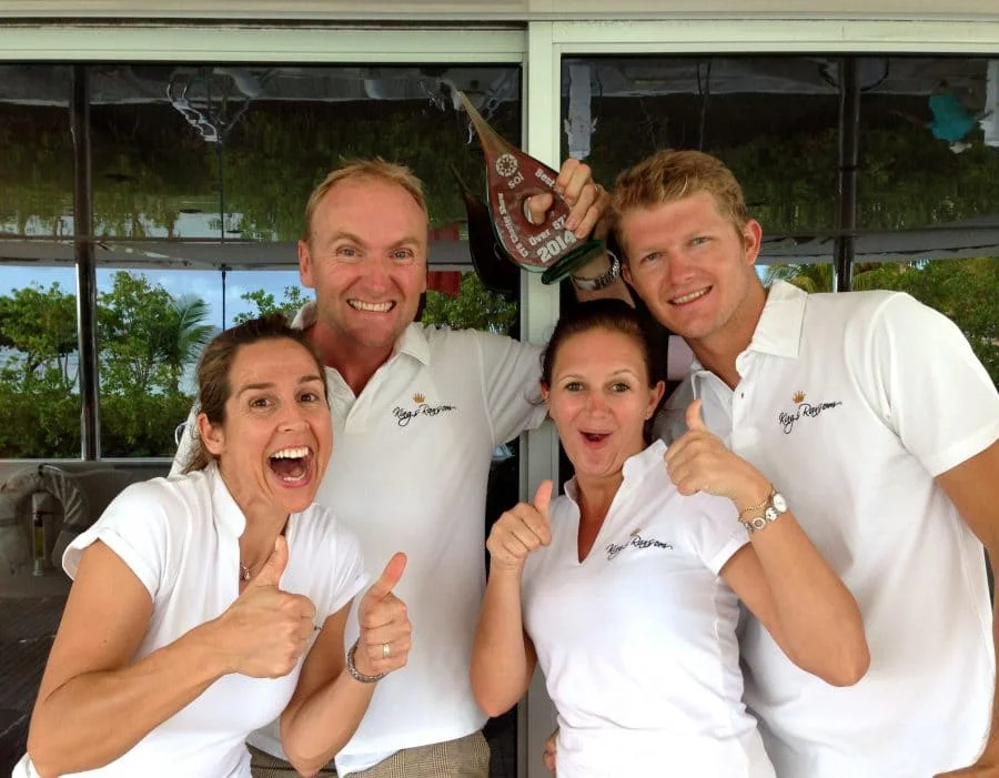 Crew of Kings Ransom showing their award during BVI yacht charter shows