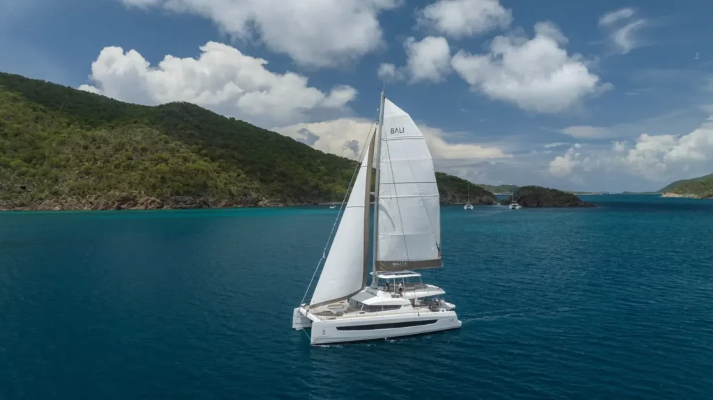 A sailing catamaran on the sea - catamaran charter