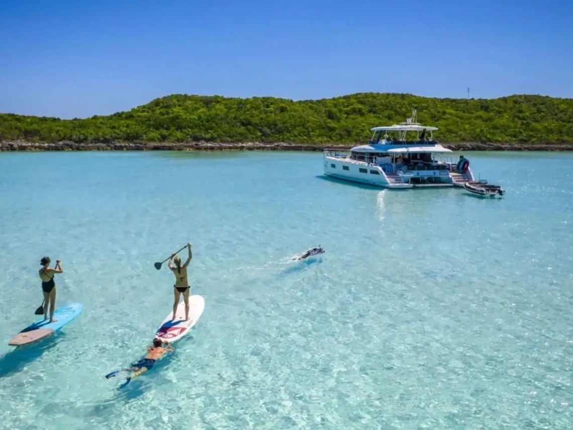 A power catamaran sailing in the Bahamas